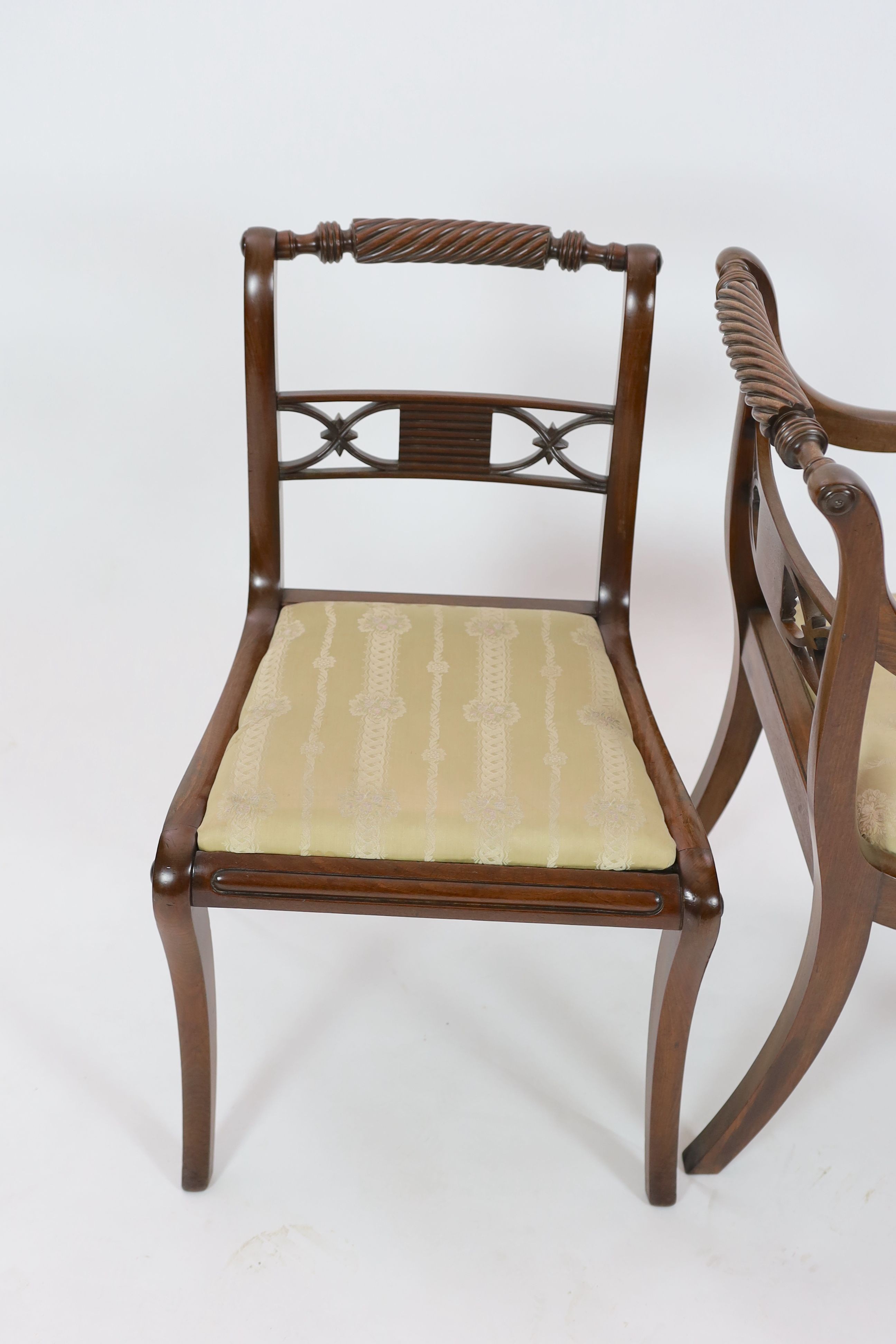 A set of eight Regency mahogany dining chairs, including two carvers, carvers W.54cm D.56cm H.84cm